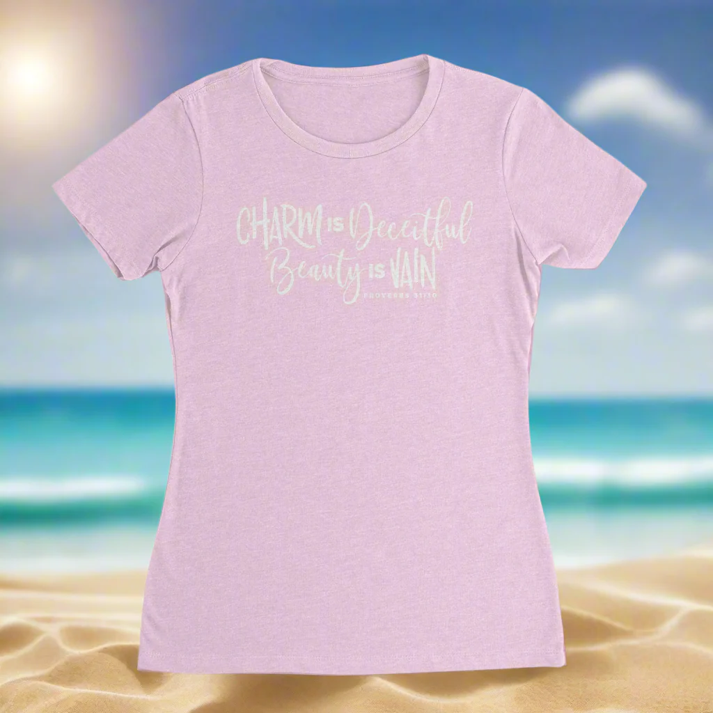 A pink crew neck t-shirt with text on the front.