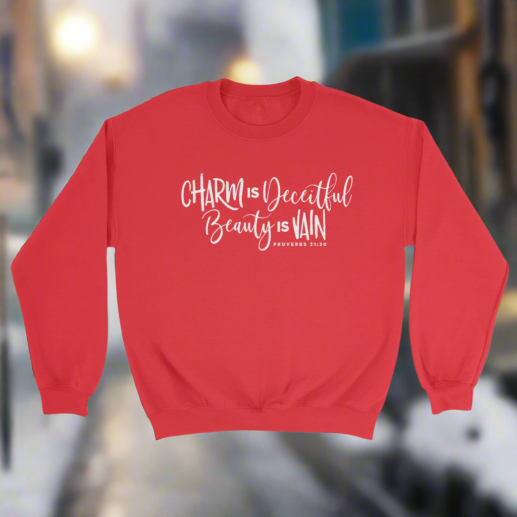 A red crewneck sweater with the text 'Charity is beautiful' printed on the front.