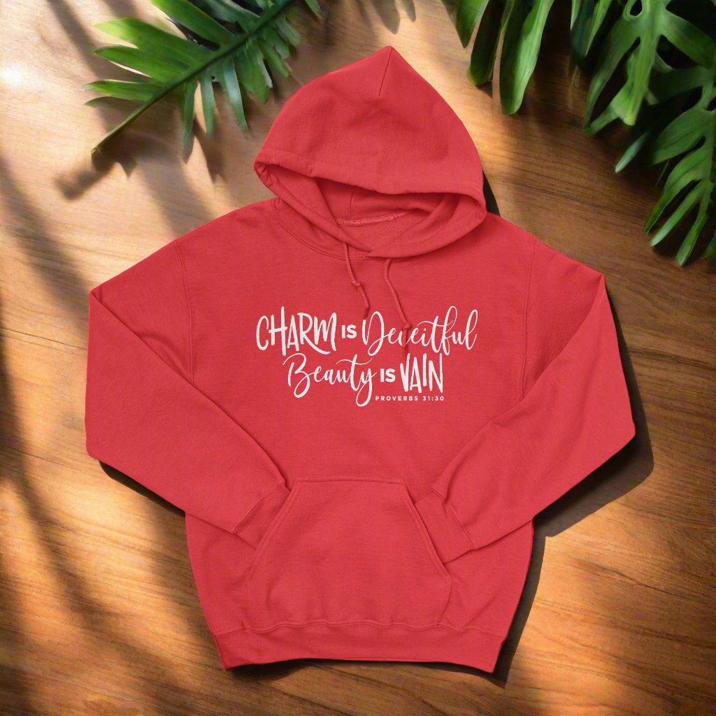 A red hoodie with the text 'Charm is beautiful' in white on the front.