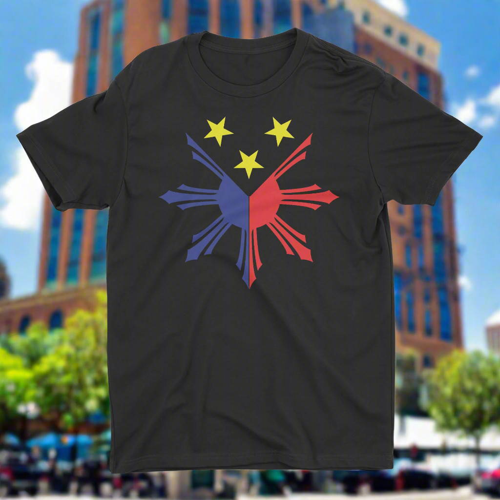 Black color t-shirt with a colorful graphic design resembling a sun and stars on the front.