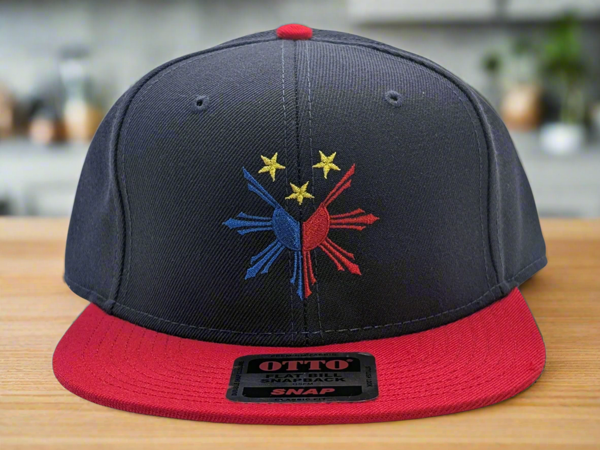 Black and red cap with embroidered design and 'OTTO' branding on a white background