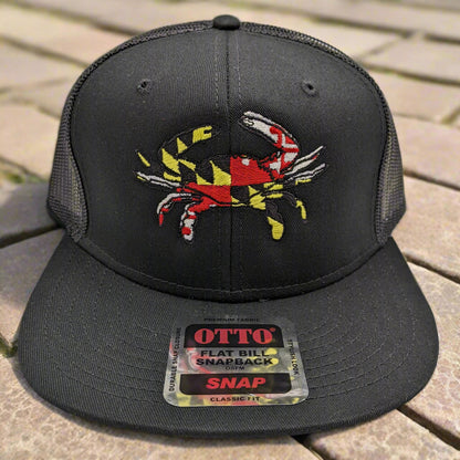 A black snapback hat with a graphic of a red crab on the front panel and the state of Maryland's flag colors on the back panel.