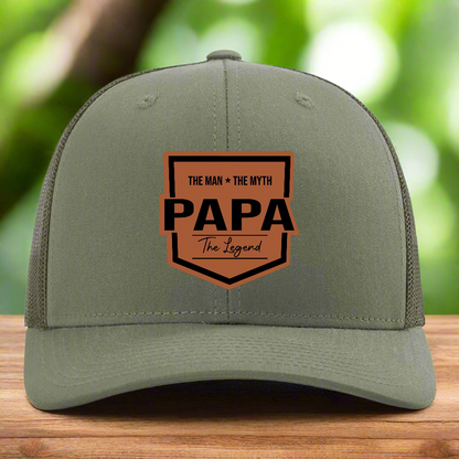 Green cap with 'PAPA The Man The Myth The Legend' text on a white background