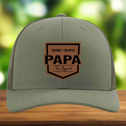 Green cap with brown and black text design on a white background