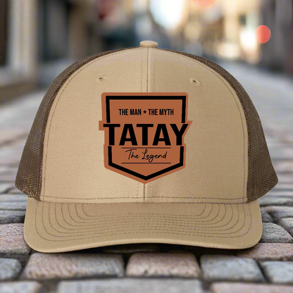 Beige and brown cap with 'TATAY' logo on a white background
