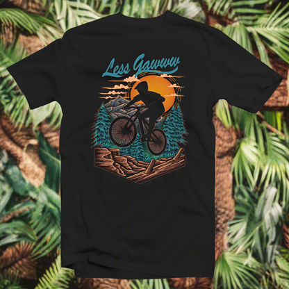 A black t-shirt with a graphic print of a person mountain biking in a sunset setting, with the text 'Less Gawwww' and 'Mountain biking'.